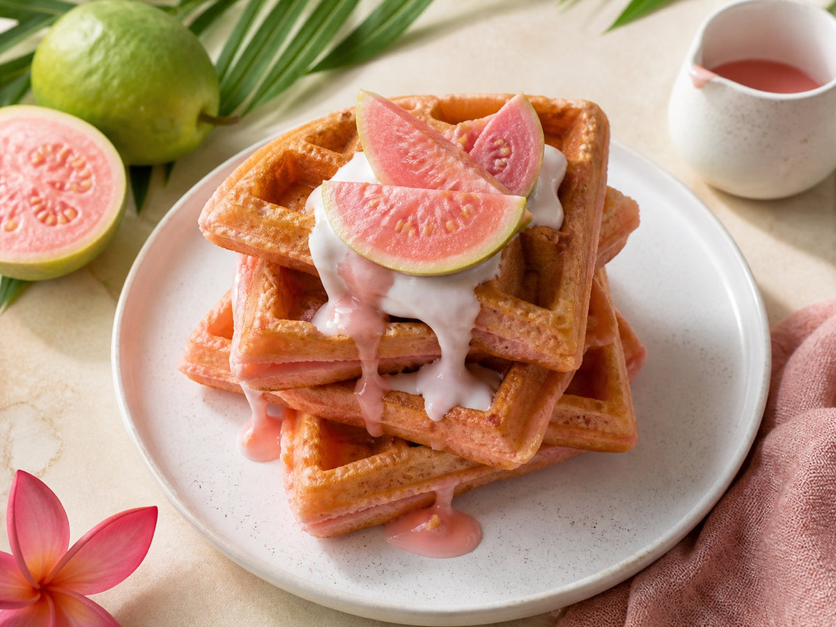Guava mochi waffles with pink guava and coconut cream.