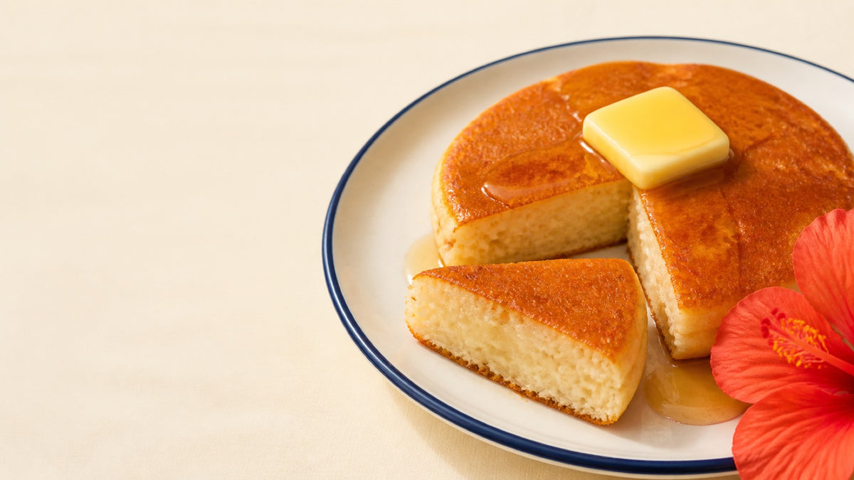 Golden mochi pancakes torn open to show their soft, chewy center.